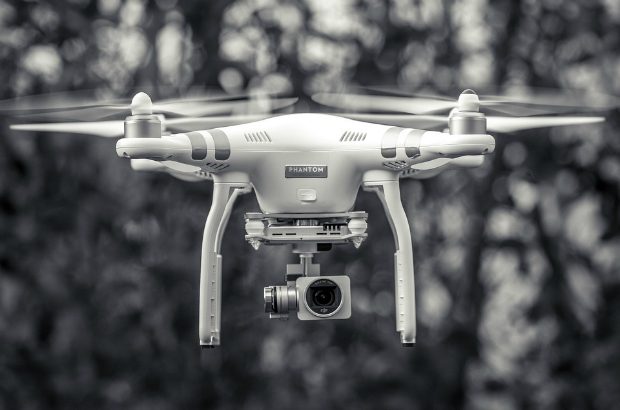 A photo of a drone (unmanned aerial vehicle) in flight